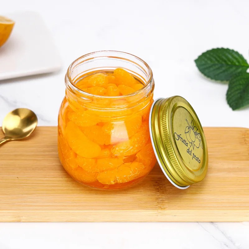 Mason glass jars with screw metal lid · photo